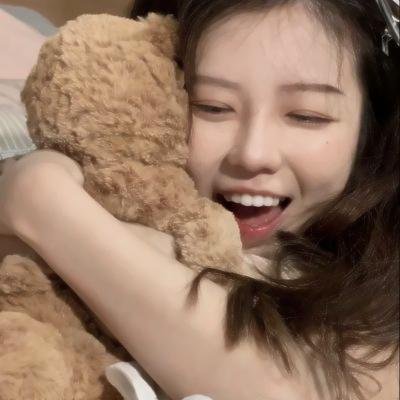 彼女